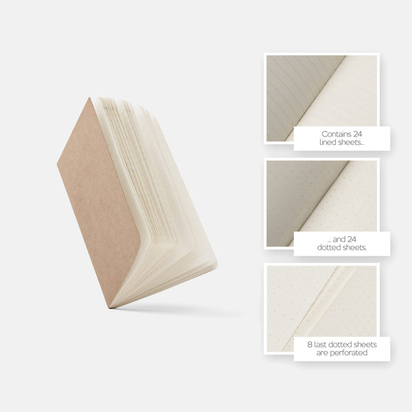 Notebook with open pages showing lined and dotted sheets on a light gray background